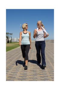 women walking on track